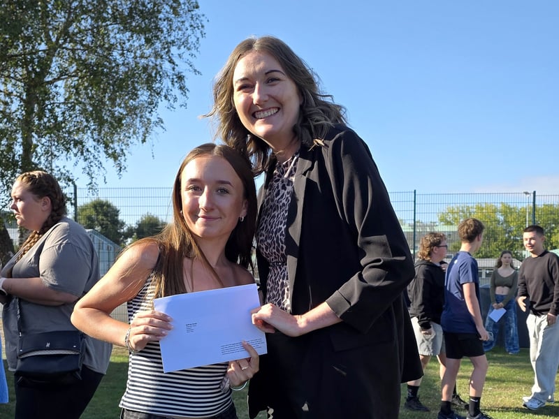 Students from King's Academy Brune Park in Gosport, collected their GCSE results this morning. 

Pictured is: Saffron Knott (16) who secured Grade 7 in Geography, Grade 6 in English Language, English Literature, Combined Science and Sociology, Grade 5 in Maths and securing a Level 2 Merit in Hospitality and Catering with headteacher Kerry Payne.