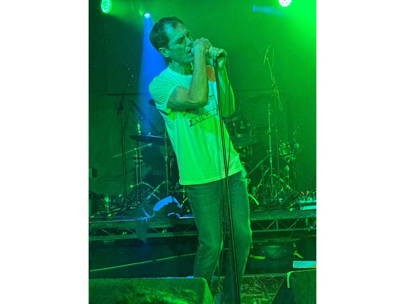 He stripped down to a tshirt for the second half of the set.