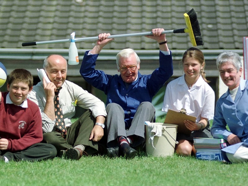 Pupil Michael Chalmers, headteacher Bill Ball, janitor Tom Saunders, pupil Madeleine Hoysden, and school auxiliary Ailsa Fergie at Cramond Primary School, Edinburgh, in 1998