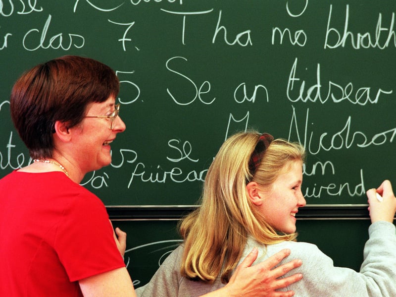 Teacher Mrs Hunter and pupil Lauren Glasgow, of Primary 7, at the Glasgow Gaelic School upon its opening in 1999. It was the first Gaelic-only school in the city.
