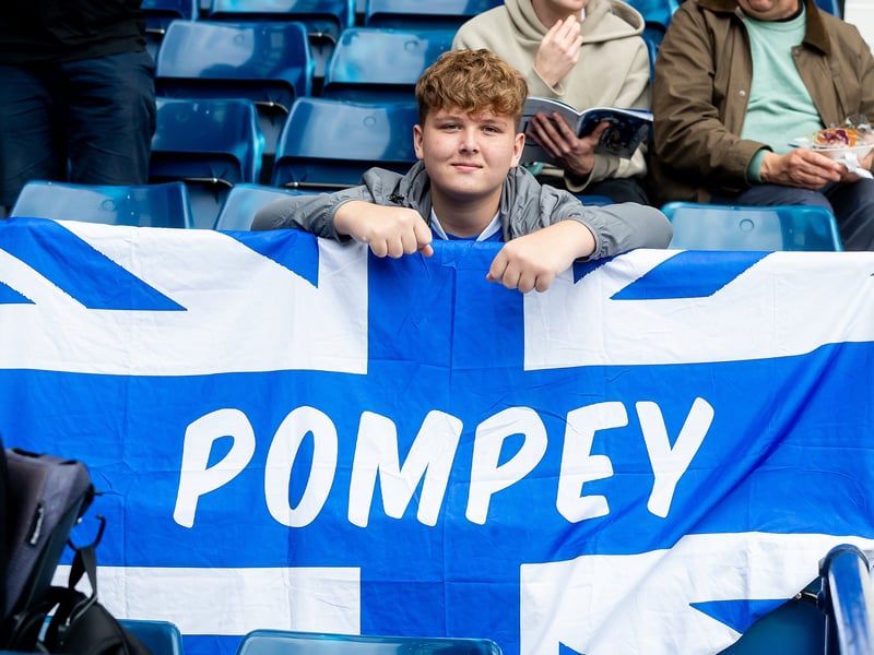 Showing off his Pompey flag.
