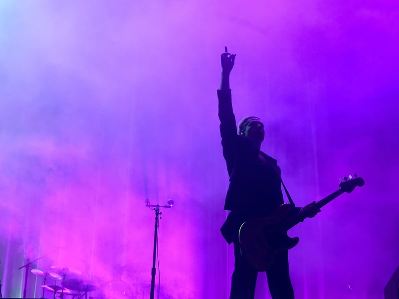 Pictured is: Queens of the Stone Age performing on Common Stage.
Picture: Sarah Standing (220825-8915)