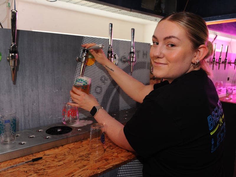 Bar supervisor Kathrine Miller keeps the beers flowing.