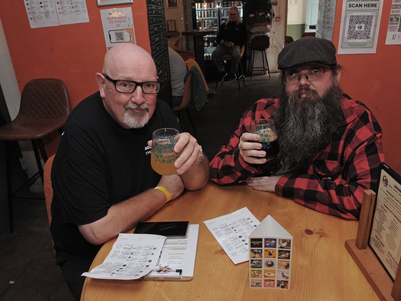 Sean Aylward of Whinmoor and his son Luke of Bradford relaxing at the beer festival.