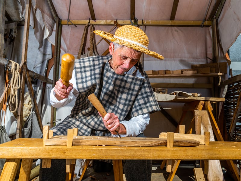 Hugh Milton giving demonstration to weekend visitors of his craft during the Roman Festival.