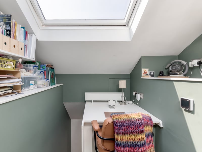 The home also includes a loft space, which is being used as a home office.