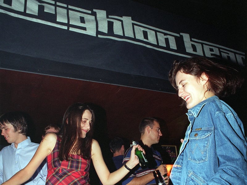 Clubbers, bottle in hand, enjoy Britpop classics. Were you one of them?