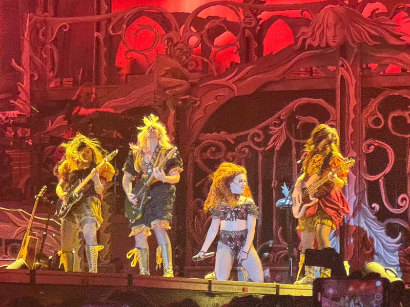 The singer was joined onstage by a team of guitar heroes.