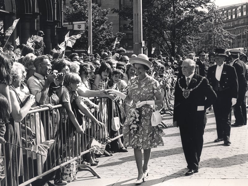 The Queen with the Lord Mayor of Sheffield, Councillor Albert Richardson, during her walkabout on Fargate, Sheffield, on July 19, 1975