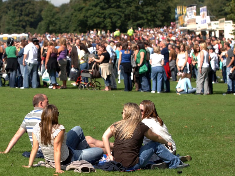 Fans queue in Roundhay Park, Leeds, on September 8, 2006,  before the gates open for the Robbie Williams concert