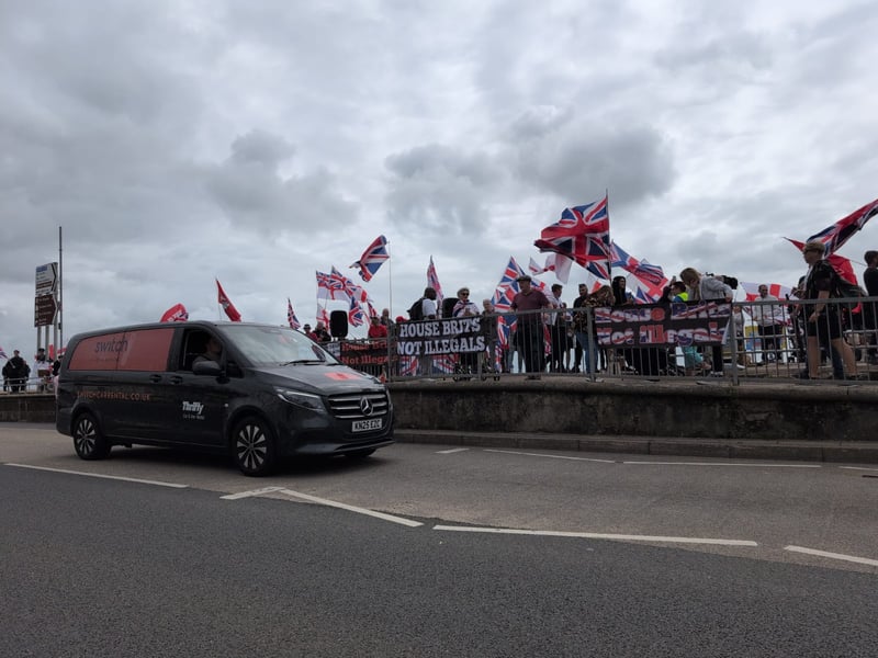 Anti-racism and anti-immigration protestors face each other on Eastney Esplanade near South Parade Pier.