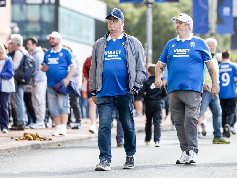 Rangers fans arrive ahead of the game against Celtic.