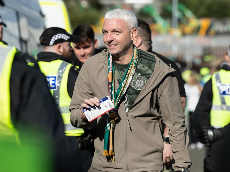 Celtic fans arrive ahead at the Ibrox away end.