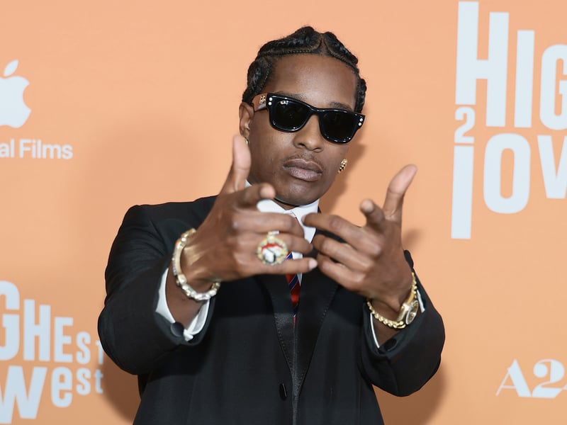 The album cover to the rapper's debut mixtape, 'Live. Love. ASAP,' bears a striking resemblance to OutKast's Stankonia cover. Both feature a stylised, black-and-white American flag as a backdrop with the artist in a prominent pose and the title written vertically on the side.