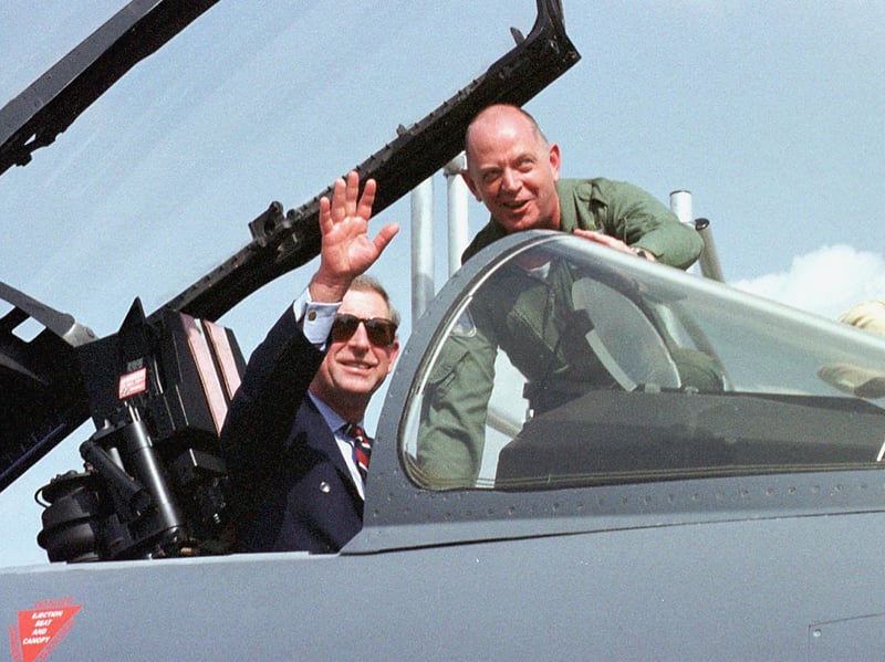 Prince Charles waves from the cockpit of a Eurofighter in November 1999, at the Dubai air show