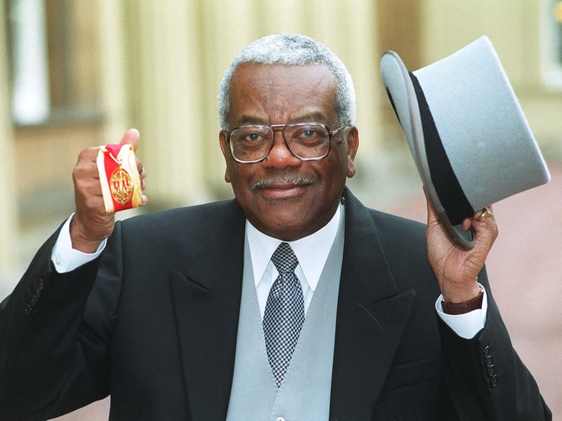 ITV newsreader Sir Trevor McDonald pictured outside Buckingham Palace after receiving his knighthood in 1999