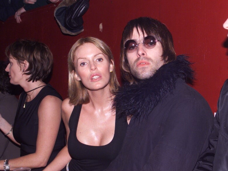 Oasis frontman Liam Gallagher with his wife, the actor Patsy Kensit, at a concert by The Who in December 1999