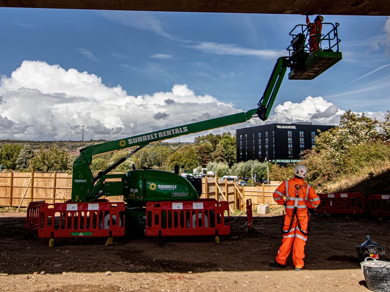 Work underway to repair concrete on the underside on the M27 bridge at the Hilsea Interchange.