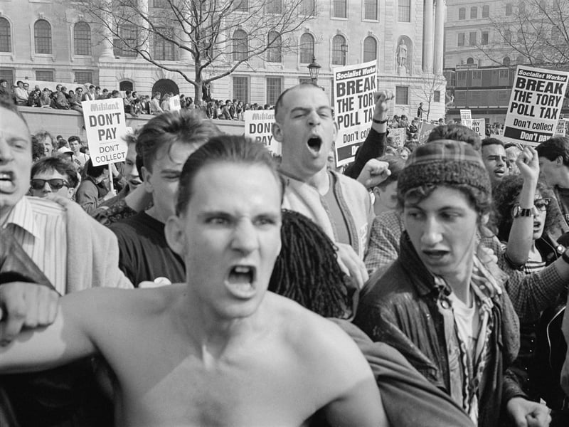 Protesters at a demonstration against the Poll Tax, which later became a riot known as the 'Battle of Trafalgar', in London, on March 31, 1990