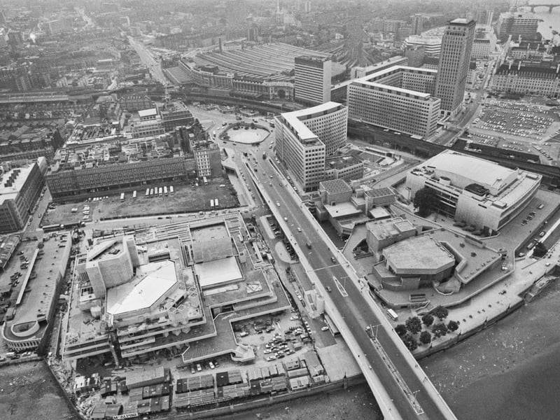 An aerial view of the Royal National Theatre (left) and Royal Festival Hall (right) at the end of Waterloo Bridge on the South Bank of the River Thames in London, in July 1973