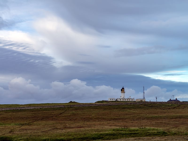 Caithness and the north coast of Sutherland offers a large area of unspoilt scenery in the far north of mainland Scotland. With little light pollution, there are plenty of places to go aurora hunting in this area, including the picturesque lighthouse at Noss Head.