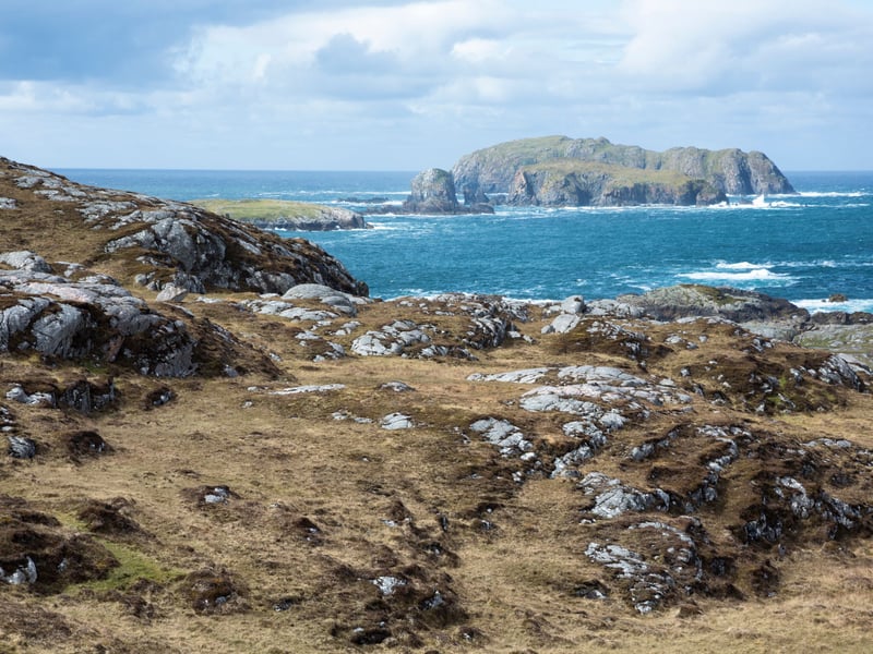 Another island destination offering the perfect combination of dark skies and a northern latitude is the Outer Hebrides. For a truly magical experience, try to see them over the atmospheric Callanish Standing Stones on Lewis. 