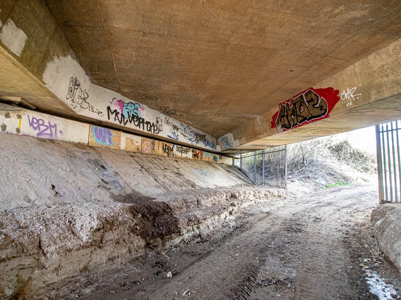 Before the project could begin, it took three weeks to get the site ready including digging a road underneath the bridge for equipment and machinery to be brought in.