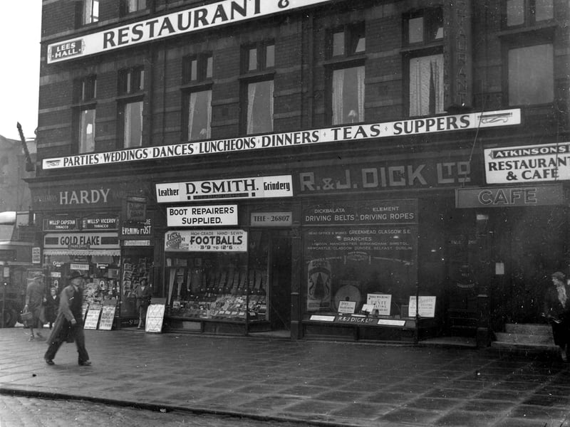 Eastgate in September 1937. In view of Atkinsons Restaurant and Cafe (on the right) at number 2 Eastgate. R. & J. Dick belting manufacturers can be seen next door on the left with David Smith, Leather Maunfacturers at number 6. At number 8 is Charles Hardy, Hairdresser and Confectioner can be seen at number 2 on junction with Harewood Street.