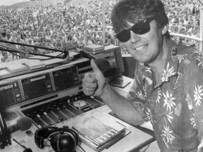 DJ Mike Read takes the stage at Castle Field, Southsea, as a huge crowd turns out for the Radio 1 roadshow