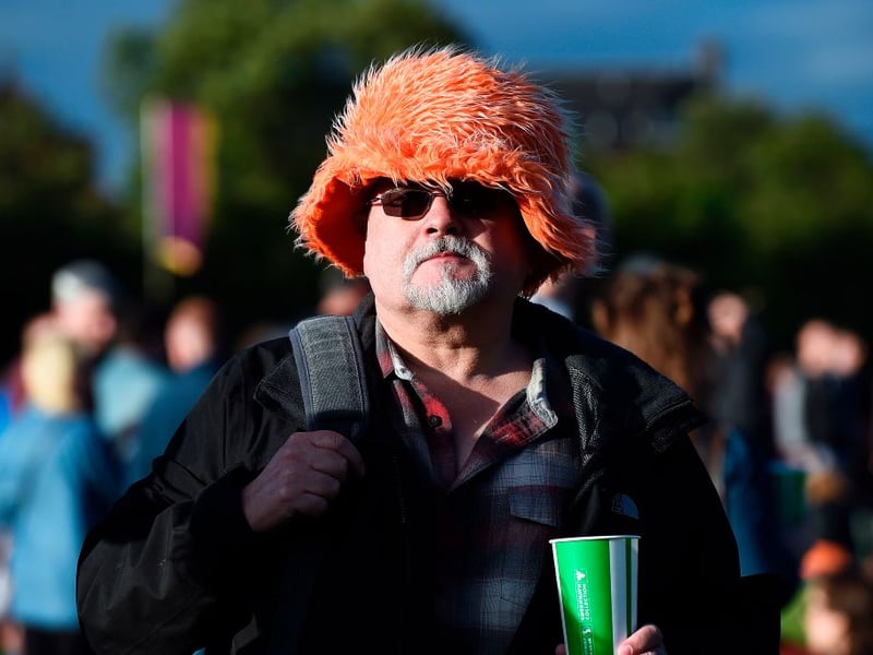 A fan awaits Radiohead's arrival on stage.