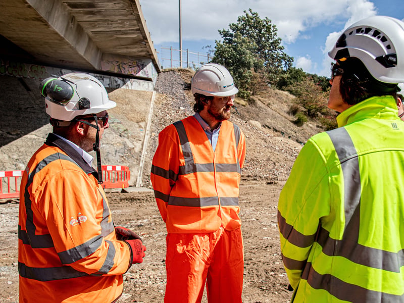 Andy Weeks, project manager for VolkerLaser with reporter Joe Williams and Katarina Saradinova, head of scheme delivery at National Highways.