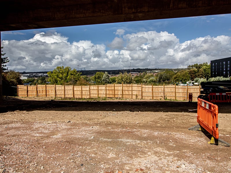 The wooden fencing was erected to stop people entering the site. It was a spot known for people to go with bikes and some concrete was damaged after a bike had been burnt against it.