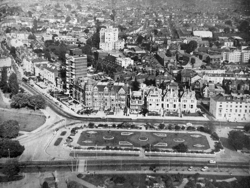 An aerial view of Southsea, captured from above the Rock Gardens, on the seafront. Clarence Parade and Lennox Road South can be seen leading towards the top of the picture, with Florence Road to the right.