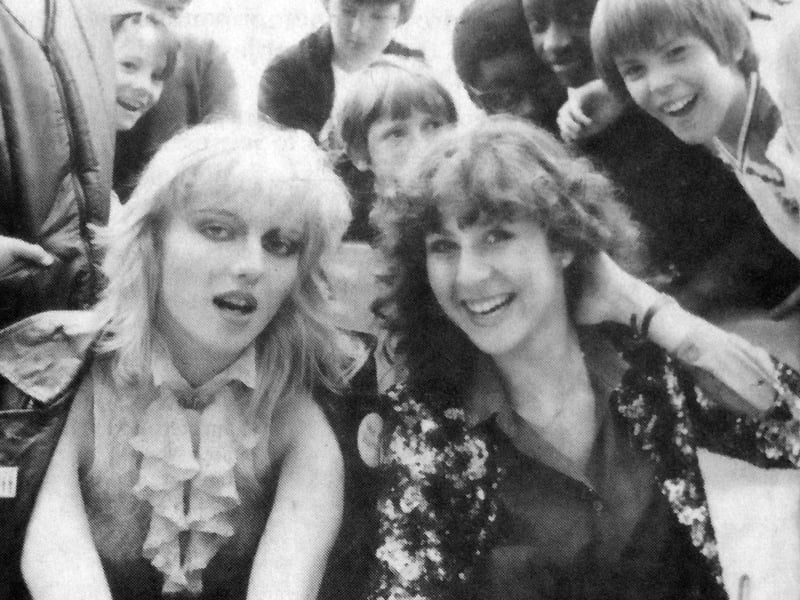 Hot Gossip dancer Jane Newman, left, and singer Louise Borne are surrounded by youngsters as they don their skates at Southsea's new tri-skating rink