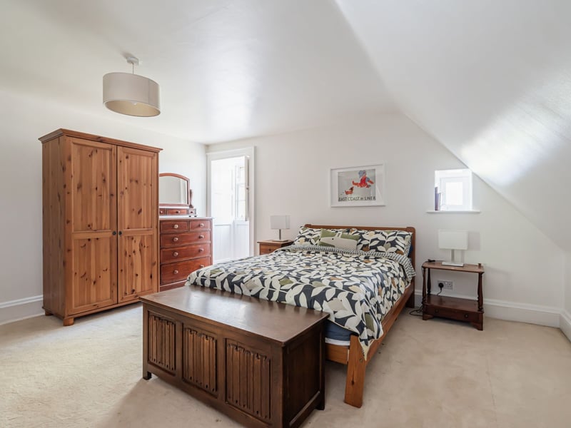 Located on the second floor is the substantial principal bedroom featuring an en-suite bathroom.