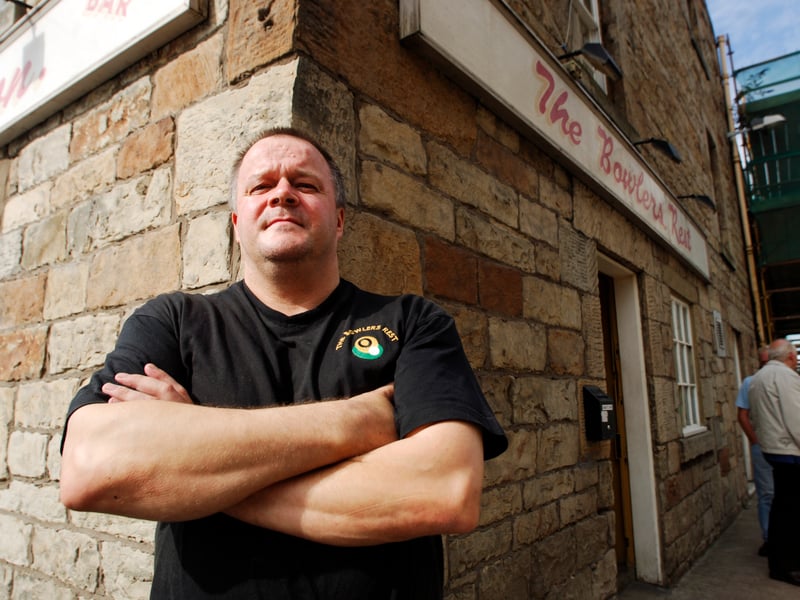 Landlord Kevin McKenzie outside The Bowlers Rest pub, Leith, in 2006