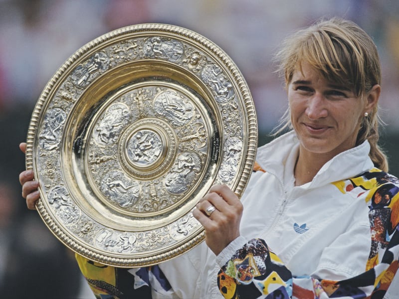 Ranked world number one for a record 377 weeks, Germany's Steffi Graf has earned a fortune estimated at $145 million. In 1988 she became the first player to complete the Golden Slam by winning all four major singles titles and the Olympic gold medal in the same year. She is the only player to have won each major singles tournament at least four times.