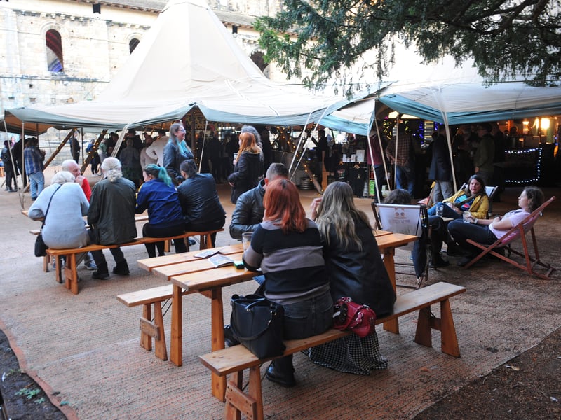 Drinkers gathering at the annual four-day beer festival at Kirkstall Abbey. 