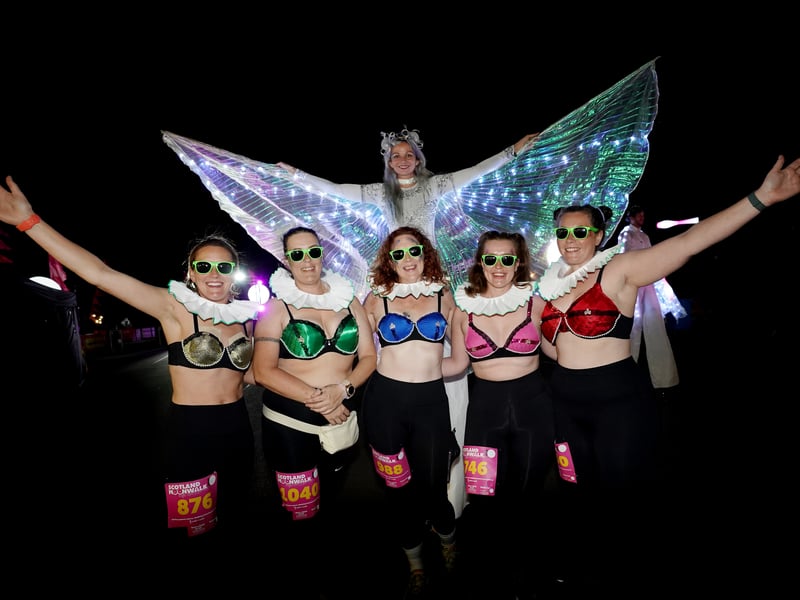 Five women sport multi-coloured bras ready to take to the streets of Edinburgh for charity 