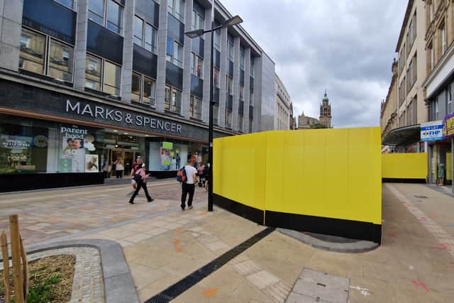 The striking yellow structure juts half way across Fargate.