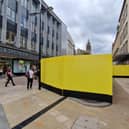 The striking yellow structure juts half way across Fargate.