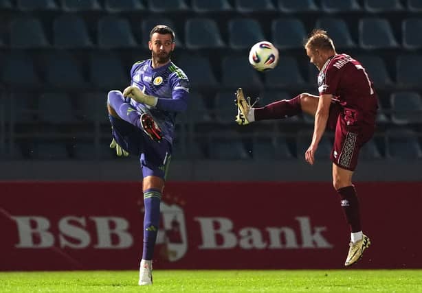 Early moment of concern when one of his clearances from a tricky Robertson back-pass was blocked by Malashevich. Did well later in half to sweep up a dangerous long ball and then made an excellent save to deny Ebong with his legs. Grew in confidence after that and can be pleased with his composed performance. 8