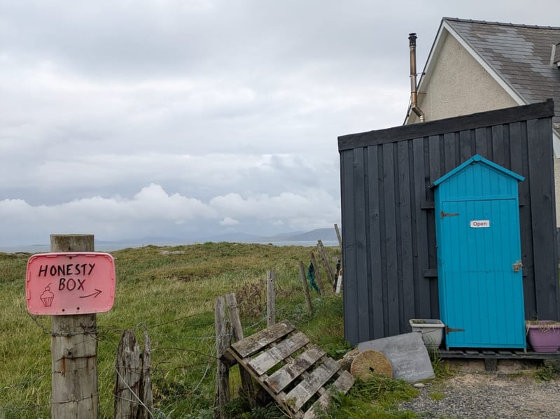 Close to the famous Barra airport, this bright blue honesty box has homebaking and fresh eggs from the croft.