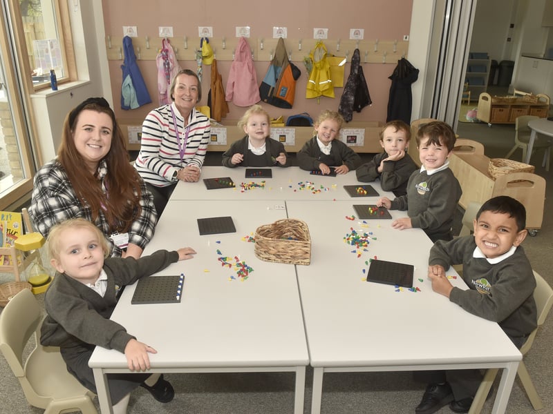 Part of the University of Chichester Academy Trust, Newlands Primary Academy in Marrelsmoor Avenue, Waterlooville, opened it's doors this month.


Pictured is: (l-r) Autumn Morris (4), Miss Nikki Moore, Mrs Debbie Pearson, Isabelle Watson (4), Lillie Blackburn (4), James Feline (4), Jesse Catchside (4) and Arthur Shibin (4).

Picture: Sarah Standing (110925-9032)

