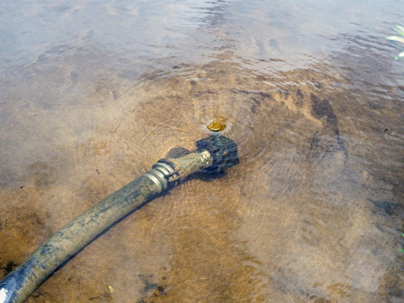 Water is sucked from the River Spey, upstream of Fochabers, by temporary pumps to support summer water supplies.