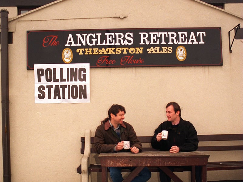 The waiting game. Polling officers Nigel Collingworth, left, and Kevin Straw, pictured outside the polling station at the Anglers Retreat pub in February 1996. It was the smallest polling station in the Hemsworth by-election, catering for only 18 voters.