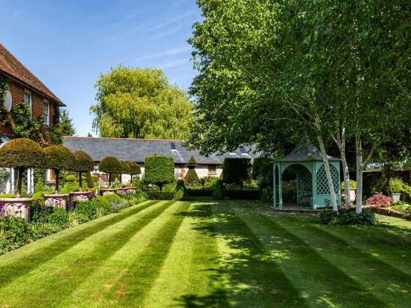 The listing says: "Originally dating from the late 17th century, Manor Farm House is a Grade II listed detached house, tucked away on a quiet lane in the conservation area of the picturesque village of Holybourne."