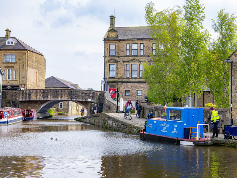An hour's drive from Leeds is the historic market town of Skipton, known for its picturesque canal, medieval castle, and bustling market, it offers visitors a mix of charming shops, vibrant eateries, and beautiful surrounding countryside, making it a delightful destination for exploration in the spring.