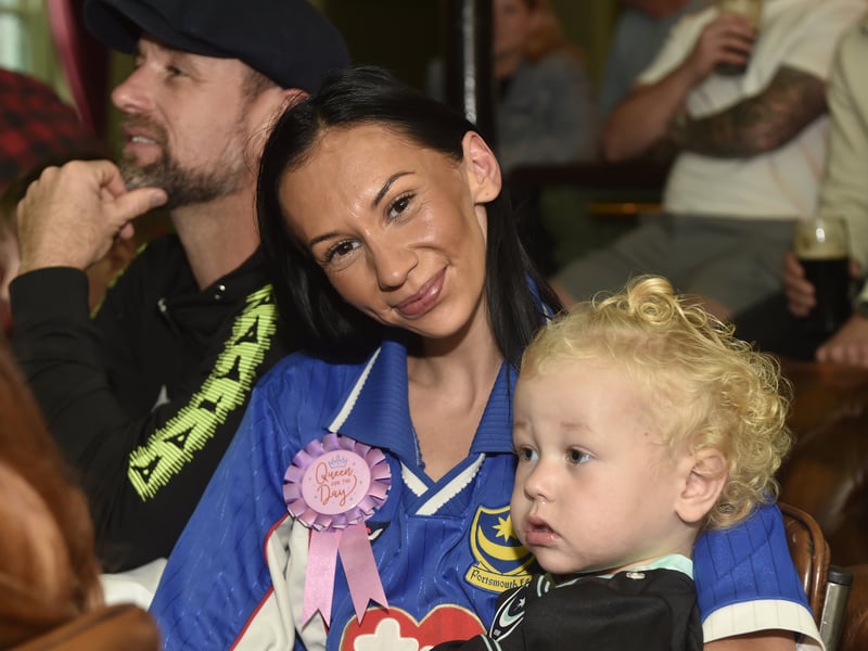 Portsmouth FC fans watching the South-Coast Derby match between Southampton FC v Portsmouth FC at The Kings Pub in Albert Road, Southsea, on Sunday, September 14, 2025. 
Pictured is: Sophie Banks celebrating her 27th birthday with her daughter Lyla (2).
Picture: Sarah Standing (140925-9322)