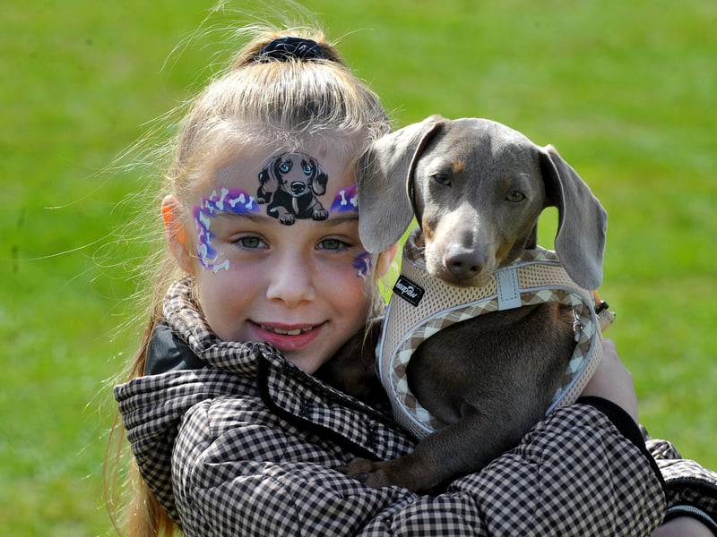 Coco Varley, seven, of Methley with her dachshund Pablo
